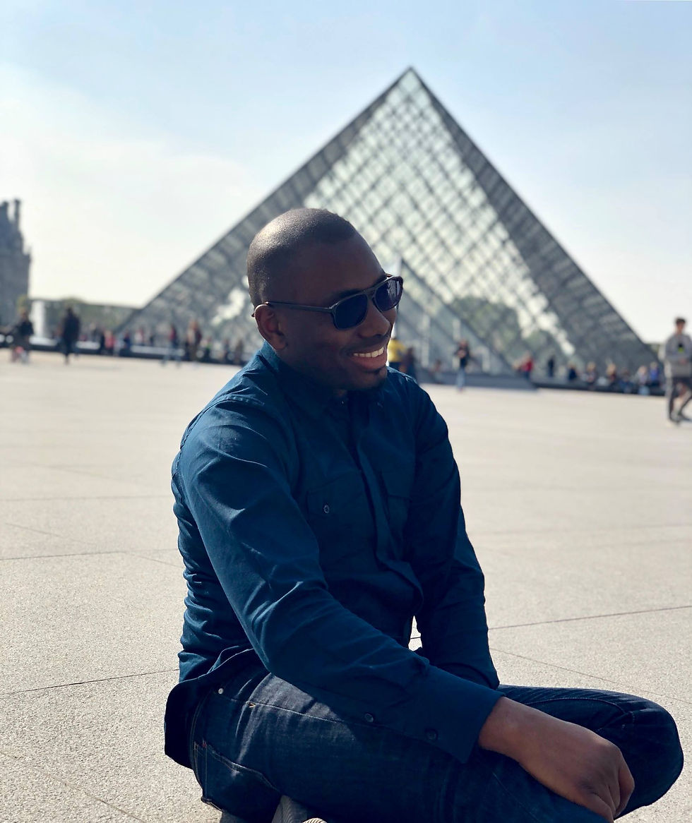 Temi Wright outside Louvre pyramid