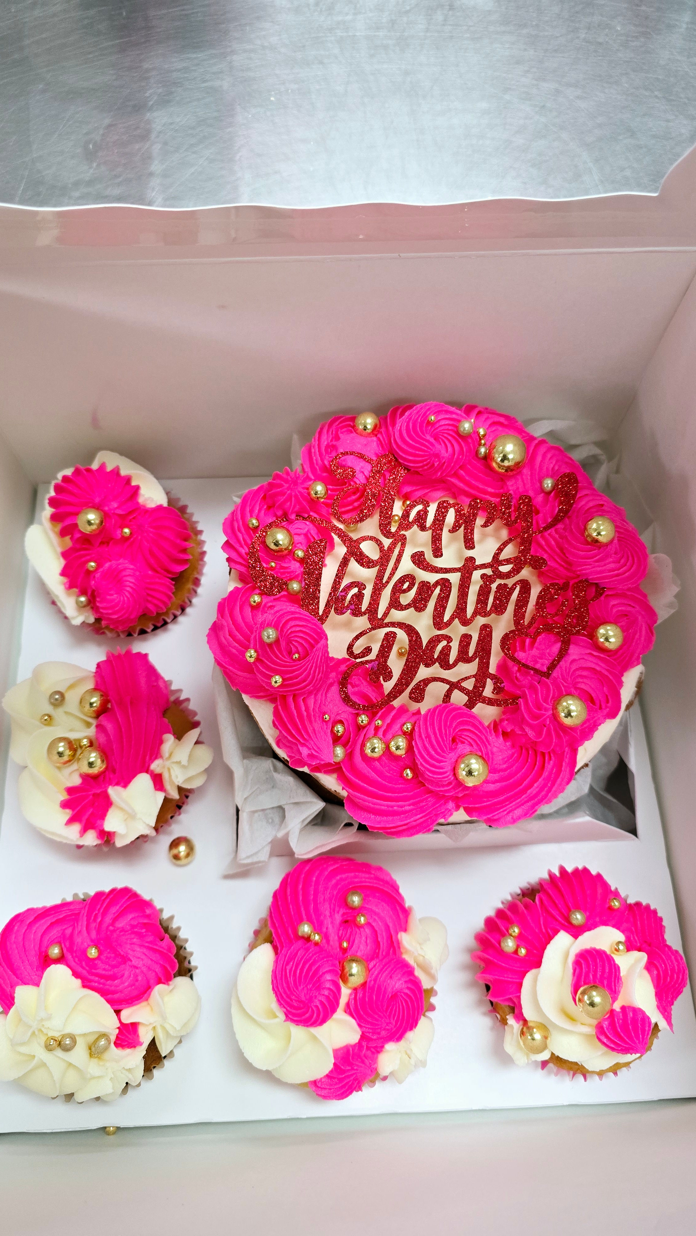 Mini Valentines Day cake with cupcakes 