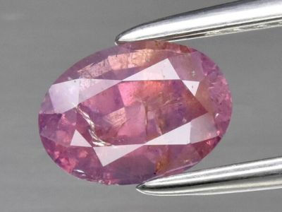 multicolored hazy oval cut sapphire