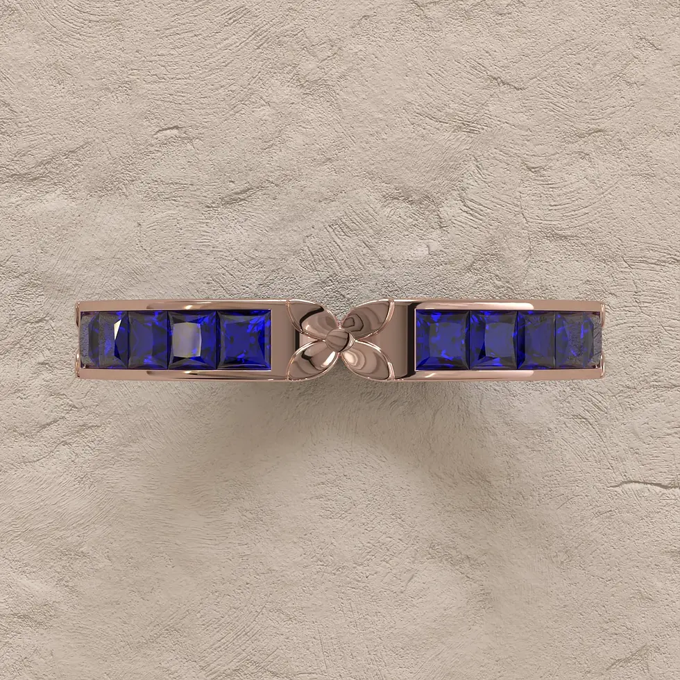 Navy Blue Sapphire in a princess cut eternity ring in 18k Rose Gold, top-down view looking straight into the stone and setting.