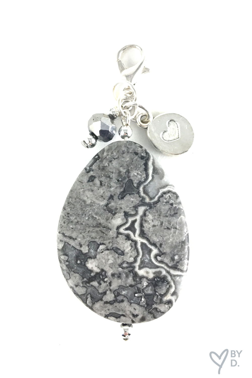 Grey stone with charms