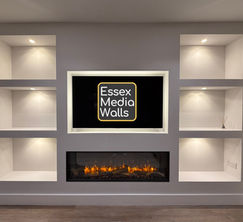 A bespoke media wall with shelving, led lighting and a Gazco eReflex Fire in Colchester.