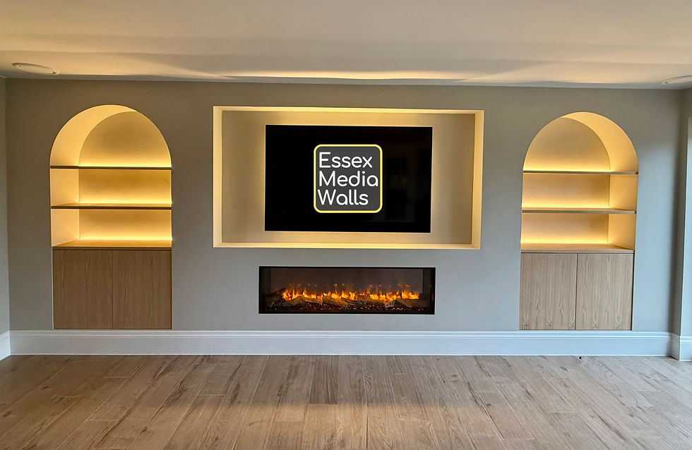 A media wall with arched oak shelving, bespoke oak cupboards, tv back lighting, cob led st