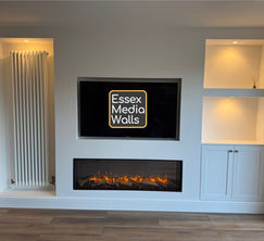 A bespoke media wall with shelving, cupboards, led lighting and a Gazco eReflex 135rw electric fire in East Hanningfield, Chelmsford.