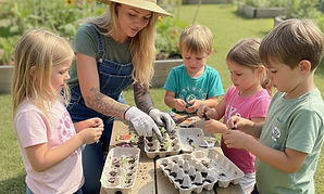 Sowing seeds with kindergarten children during educational session
