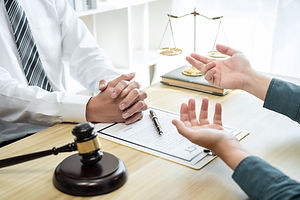 male-lawyer-is-meeting-with-man-client-to-discuss-2022-11-15-15-40-19-utc.jpg