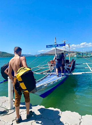 Jack stepping on a stilt boat