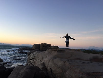 Jack on a cliff looking over the sea