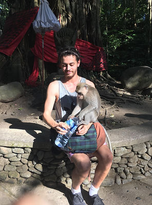 Jack giving water to a monkey