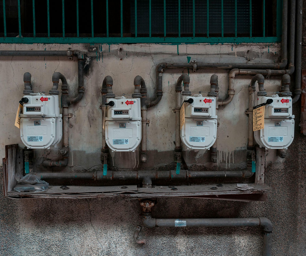 Eye-level view of a Gas Safe registered engineer inspecting a boiler