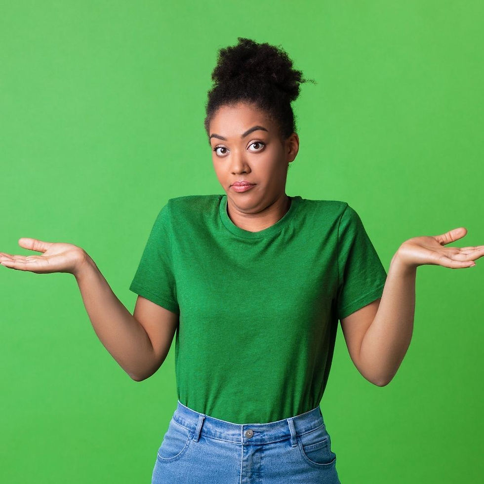 Woman in green shirt and jeans shrugging on a bright green background, looking puzzled