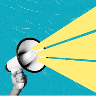 Hand holding a white megaphone projecting yellow beams on a textured blue background, creating a dynamic and impactful visual.
