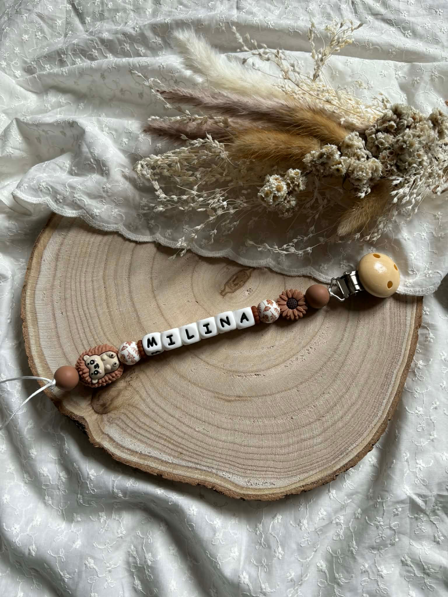 Attache tétine Hérisson marron