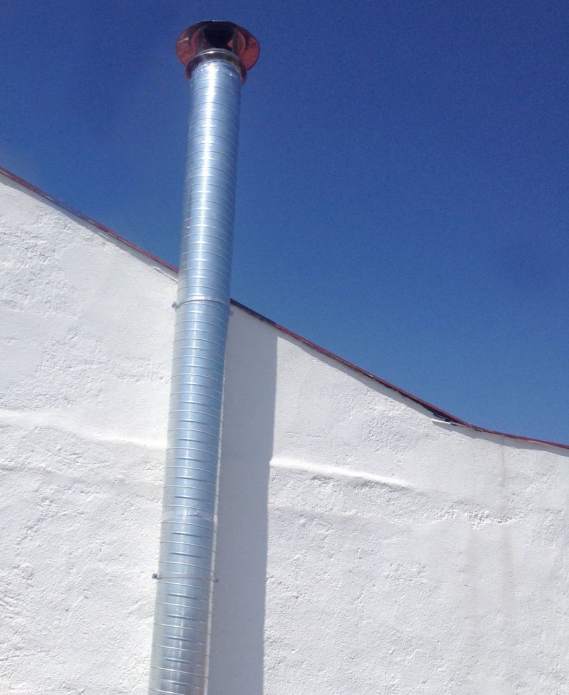 Requisitos para instalar una chimenea de extracción de humos en local