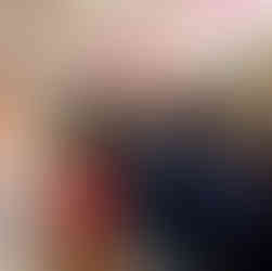 People shop at the Daiso store decorated with a pink and white balloon arch. The atmosphere appears festive and welcoming.