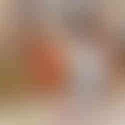 Smiling girl with curly brown hair and number 3 jersey