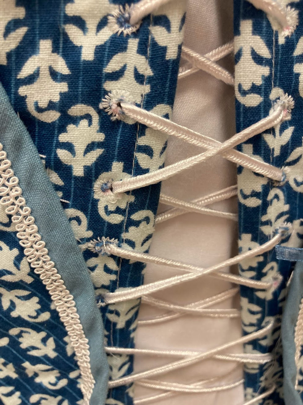 A detail of the back lacing and the eyelet holes