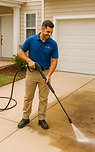 HighLux Service team member performing pressure washing – exterior cleaning for driveways and patios