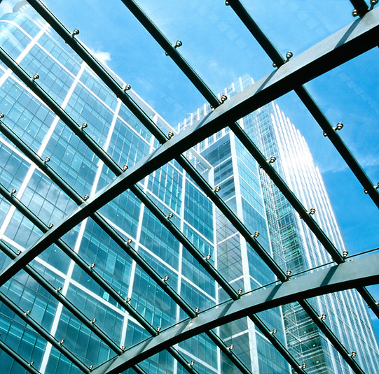 glass roof and view of city buildings