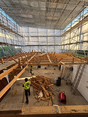 Active residential loft conversion and structural timber roof framing project in Barnet by The Construction Collective Ltd.