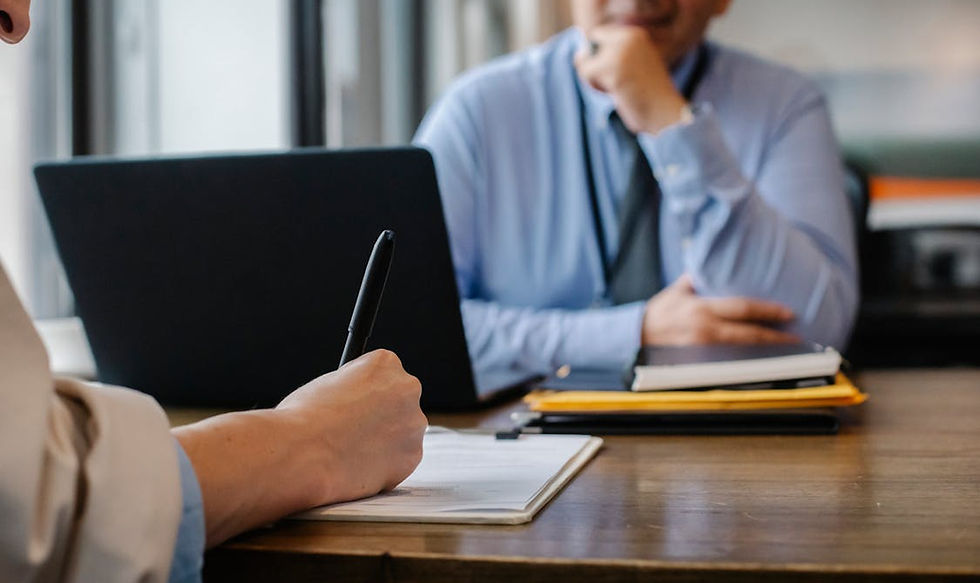 Professional divorce mediation meeting with couple and mediator