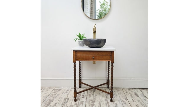 vintage vanity unit with a river-stone basin, front view