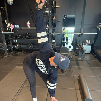 Denver Personal Trainer performs Kettlebell windmill