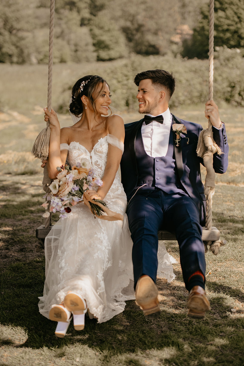 niall and tanya wedding day at oak tree barn tonbridge kent sitting on swing