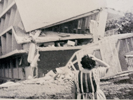 Mrs. Rothschuh surveys the A.N.S. High School after the devatating earthquake of 1972