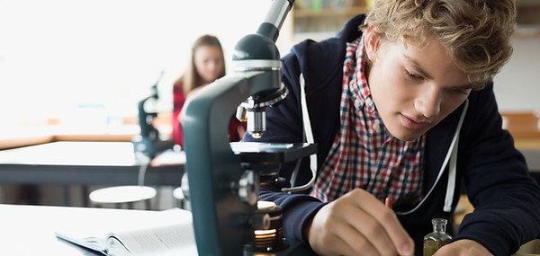 Student Using Microscope