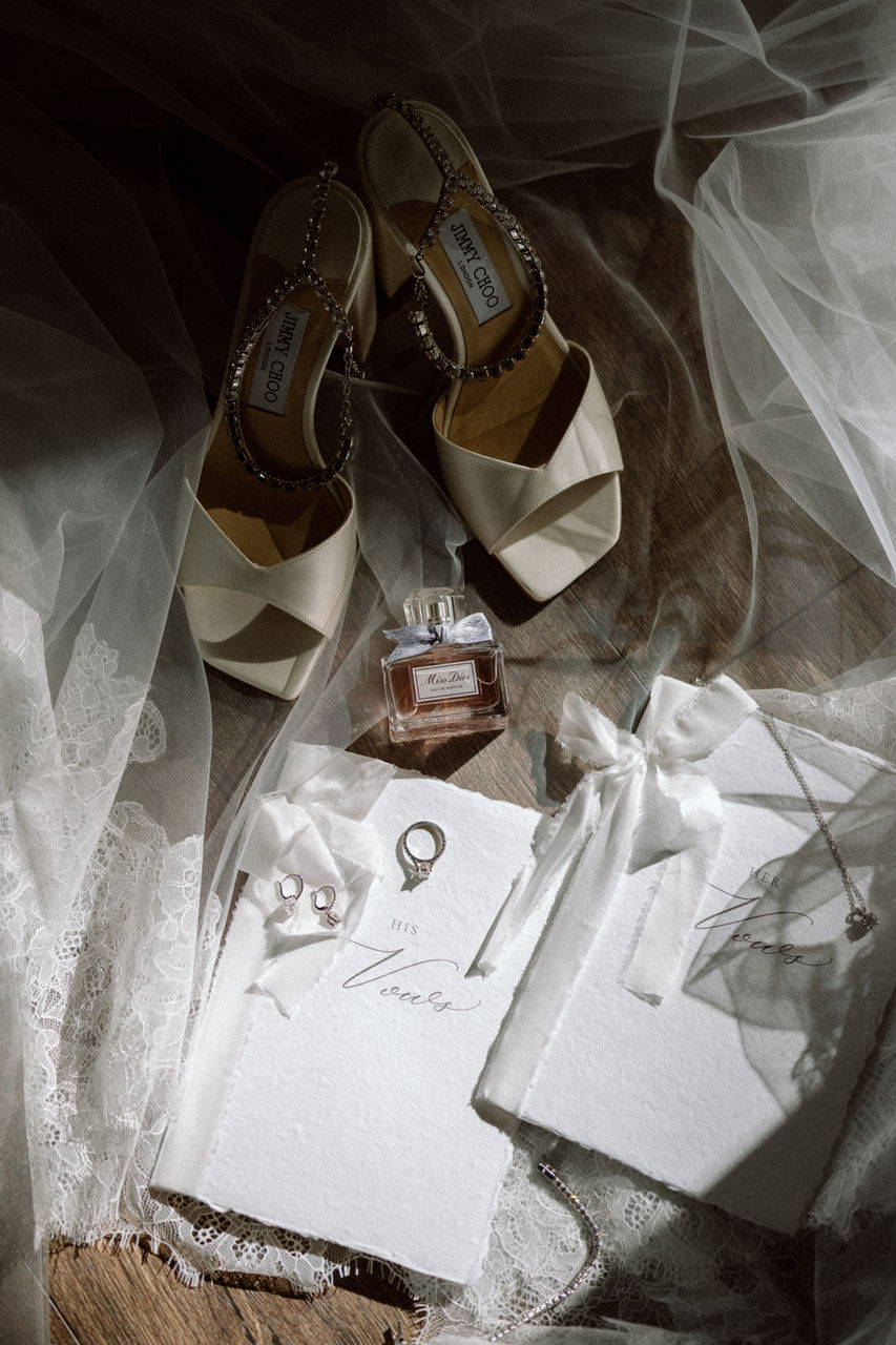 Heirloom vow books printed on handmade paper and embellished with silk ribbon