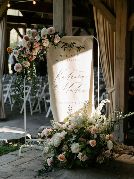 Custom fabric linen wedding welcome sign with floral accents