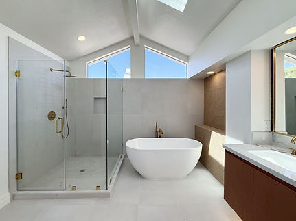 woodbridge-irvine-primary-bathroom-remodel-skylight-shower-tub-mazedesign.jpg