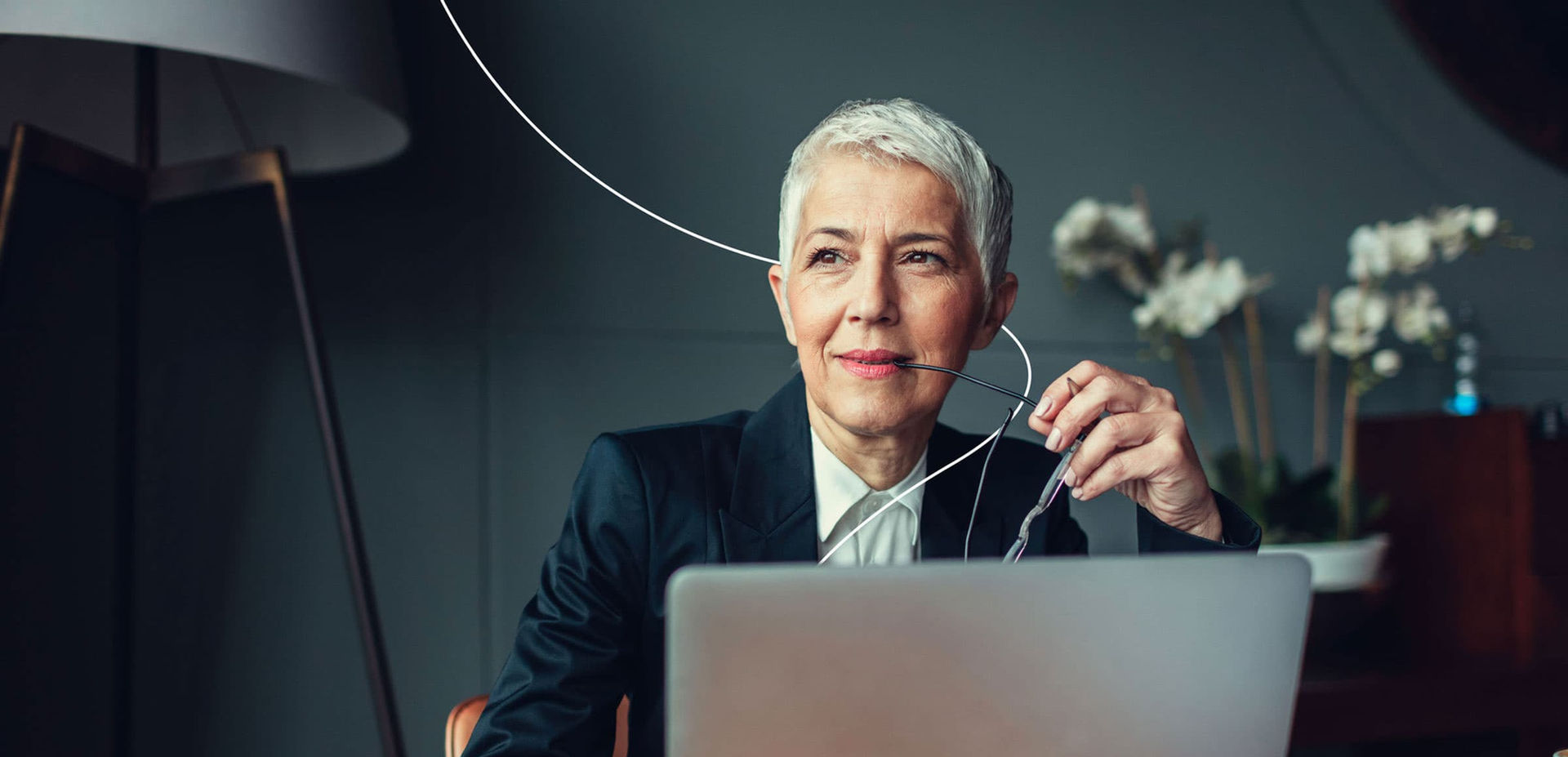 Trevose Partners recruitment photography of a senior executive with brand device