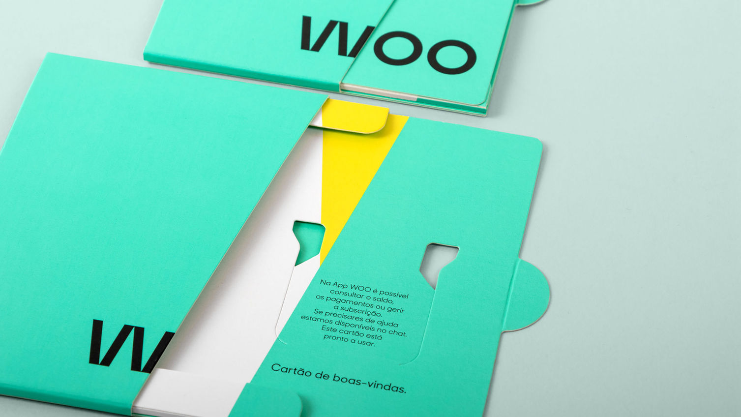A mint green sliding
package design for a bank
card