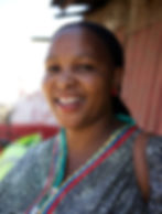 Smiling woman wearing patterned shirt