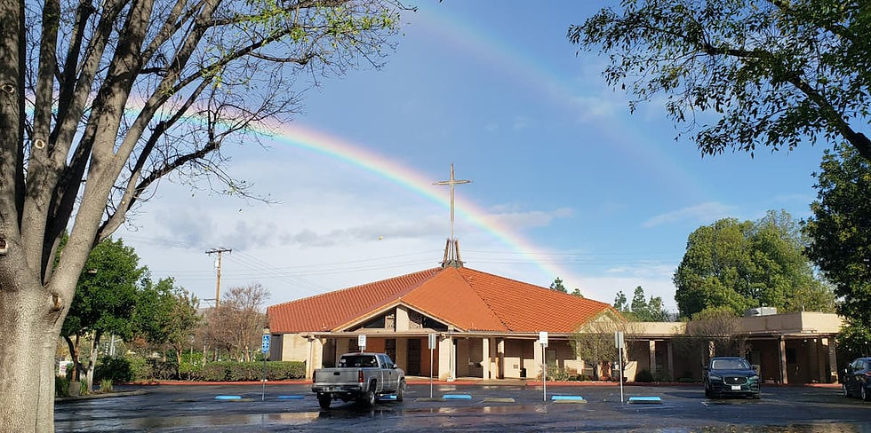 Church building with rainbow