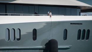 How many crew members are needed on a yacht?