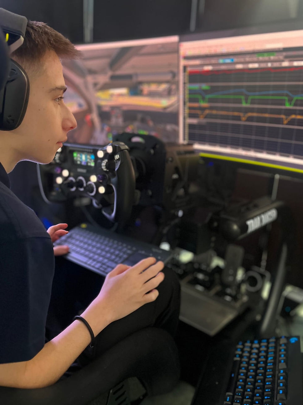 Thomas analysing data at a racing simulator
