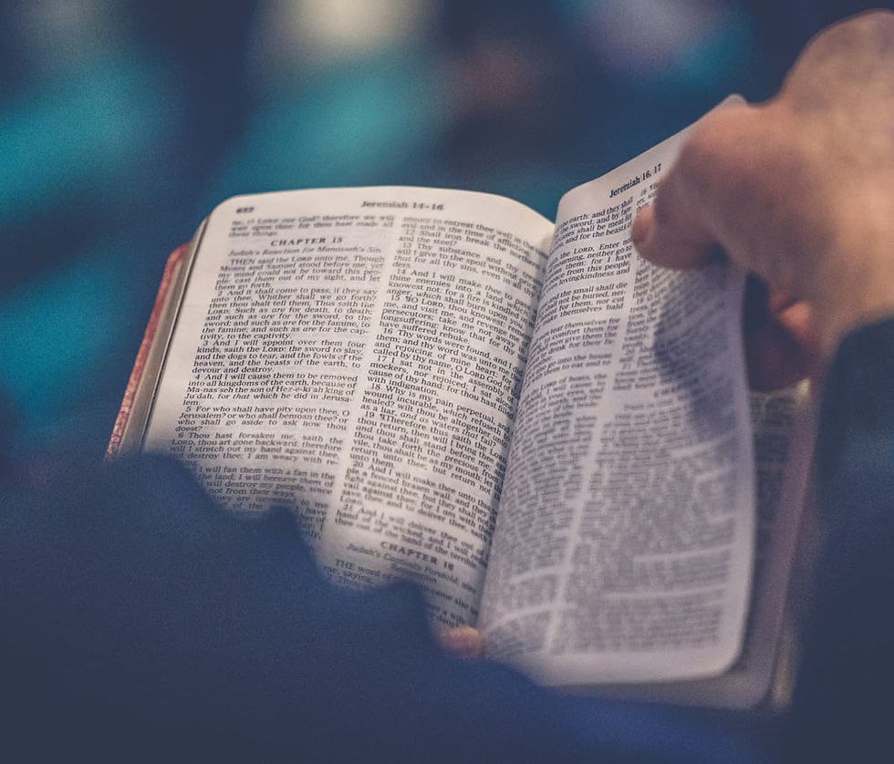 Hand turning bible page