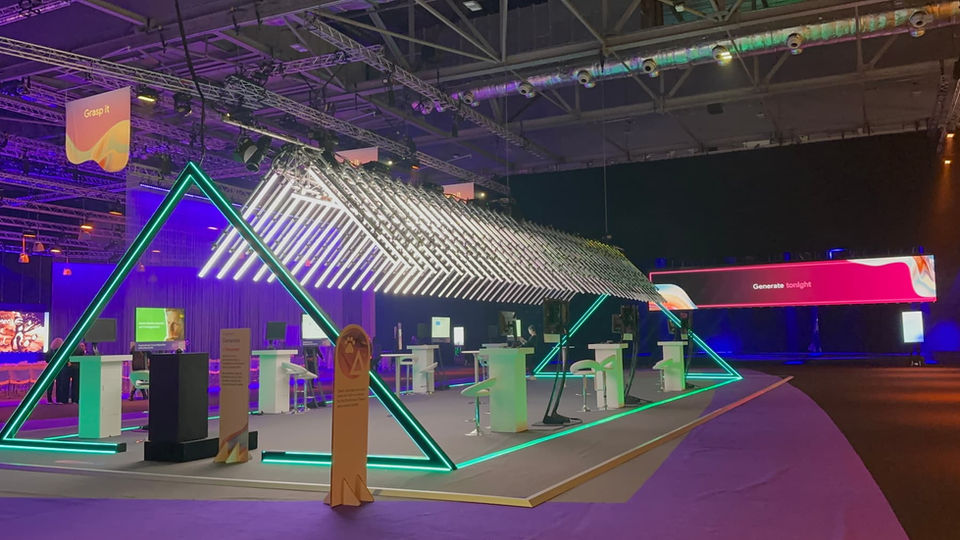 Event setup with neon lights and tables,