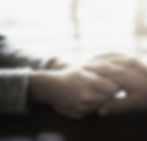 Holding hands providing psychological support for surrogates