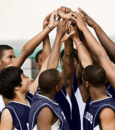 Arms Raised in Huddle