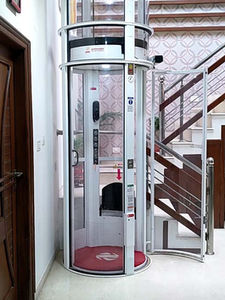 Self-Supporting Structure: The elevator's transparent tube serves as the structure itself, eliminating the need for additional support mechanisms.