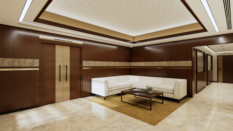 View of the executive waiting lounge revealing the spatial interplay between the corridor, conference room door, and seating zone. The beige L-seater sofa anchors the composition, set atop a custom rug that echoes the brass inlays. Dark wood paneling is rhythmically contrasted by hexagonal laser-cut light wood with integrated brass detailing. Linear profile lights embedded in the ceiling subtly unify and illuminate the material palette.