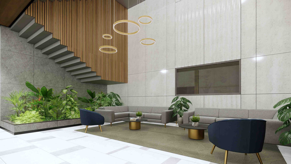 Quiet lounge area in a double height interior with sofas, accent chairs, greenery, and soft lighting for a relaxed atmosphere.