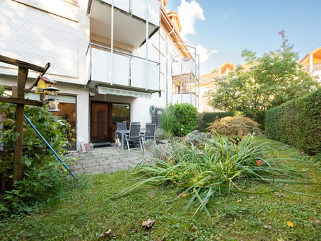Erdgeschoss-Wohnung mit Terrasse und Gartenanteil