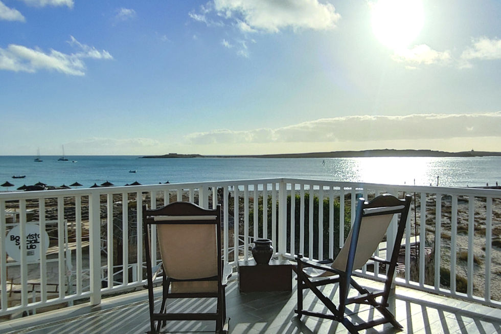 Interior suite with ocean-view terrace.