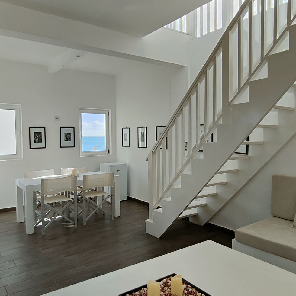 Interior suite with ocean-view terrace.