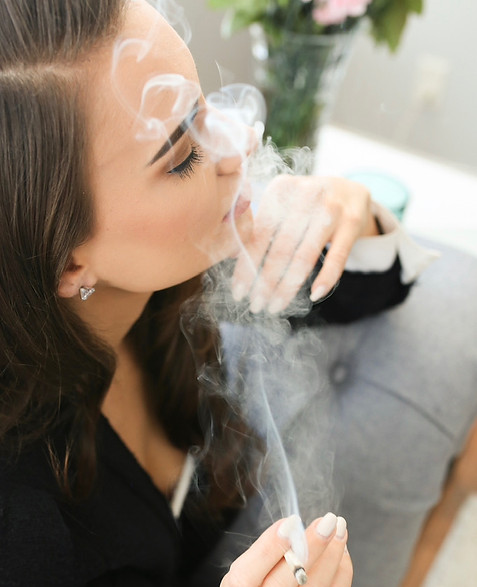 Ashley Newman finds moments of serenity and introspection while enjoying the distinctive experience of smoking the Queen of Bud Black Obsidian pre-roll.